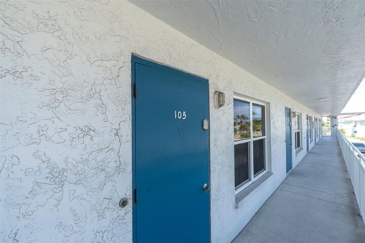 Property Photo:  9755 Harrell Avenue 105  FL 33706 