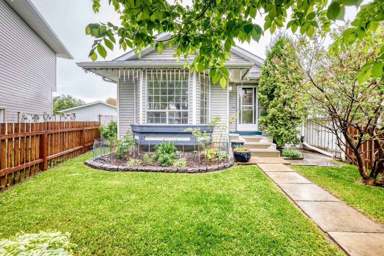 Property Photo:  16 Martinridge Way  AB T3J 3C8 
