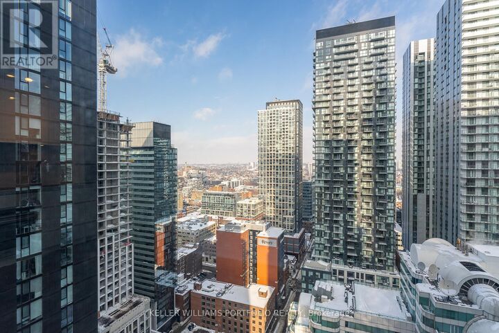 Property Photo: 115 Blue Jays Way 1909 ON M5V 0N4