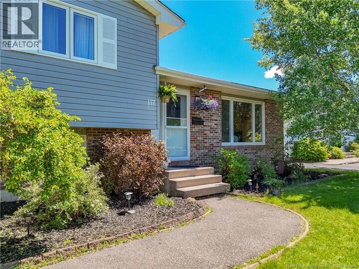 Property Photo: 117 Downsview Drive NB E2M 5E4