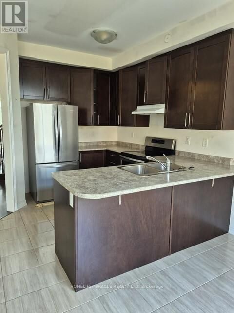 Property Photo: 80 Truro Circle ON L7A 4E5
