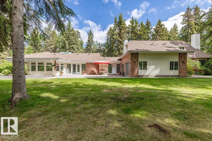 Property Photo: 244013 Twp Road 470 104 AB T9A 1W8