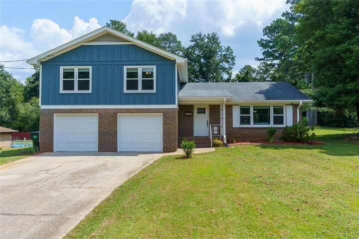 Property Photo:  5800 Cedar Lane SW  GA 30126 