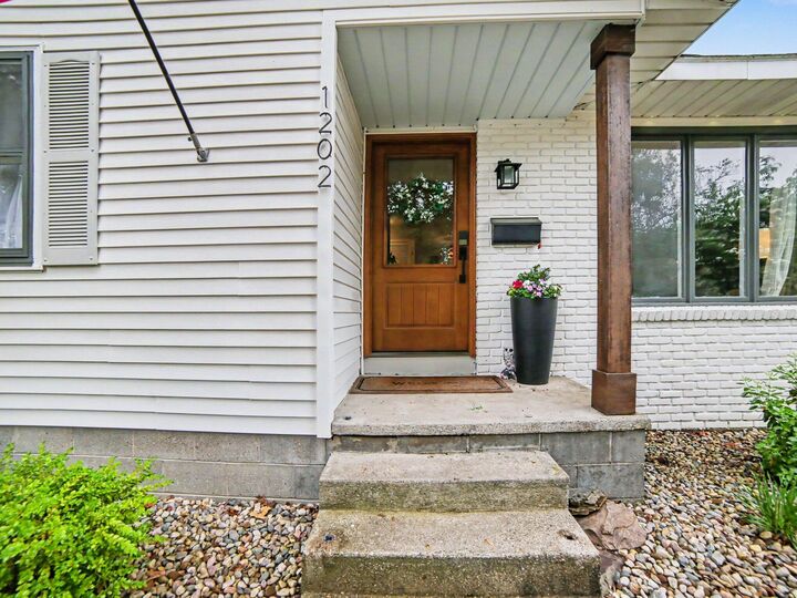 Property Photo:  1202 Woodlawn Avenue  MI 49417 