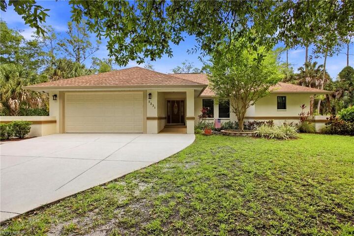 Property Photo: 5231 Hickory Wood Dr FL 34119