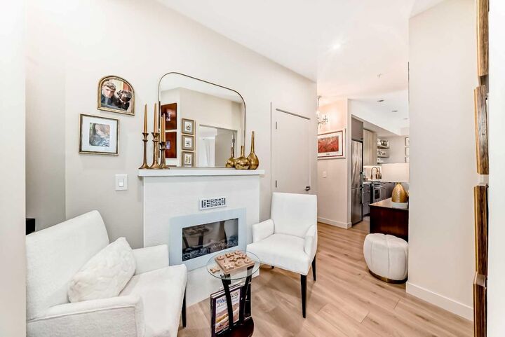 Property Photo: 383 Smith Street NW 208 AB T3B 6J9