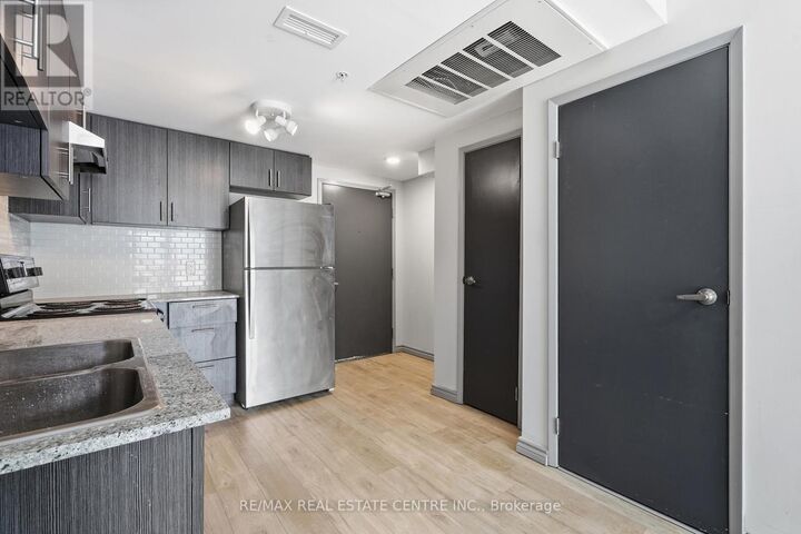 Property Photo:  275 Larch Street B02  ON N2L 3R2 