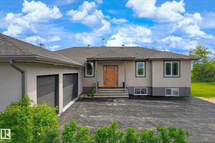 Property Photo: 56217 Rge Road 242 AB T0A 0K3