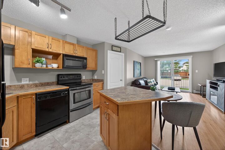 Property Photo:  3425 19 NW 111  AB T6T 2B5 