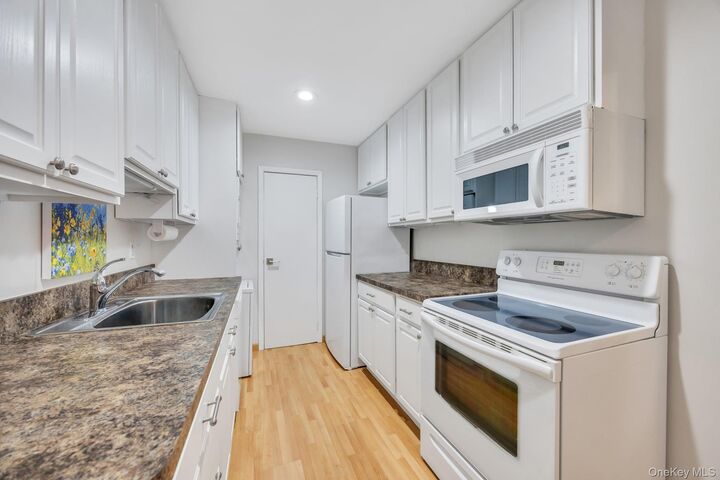 Property Photo:  703 Drew Drive D7  NY 11780 