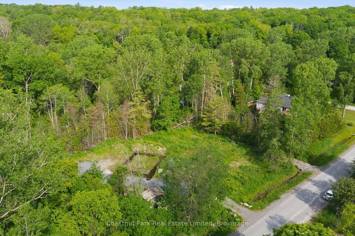 40 Whispering Woods Drive — photo 1