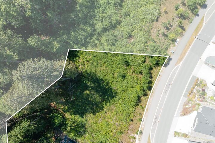Property Photo: 128 Rollie Rose Dr BC V9G 1T7