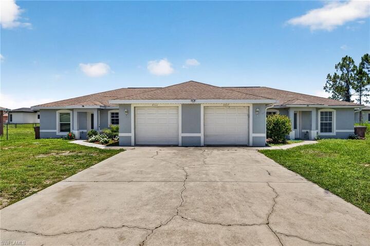 Property Photo: 4700/4702 Leonard Blvd S FL 33973