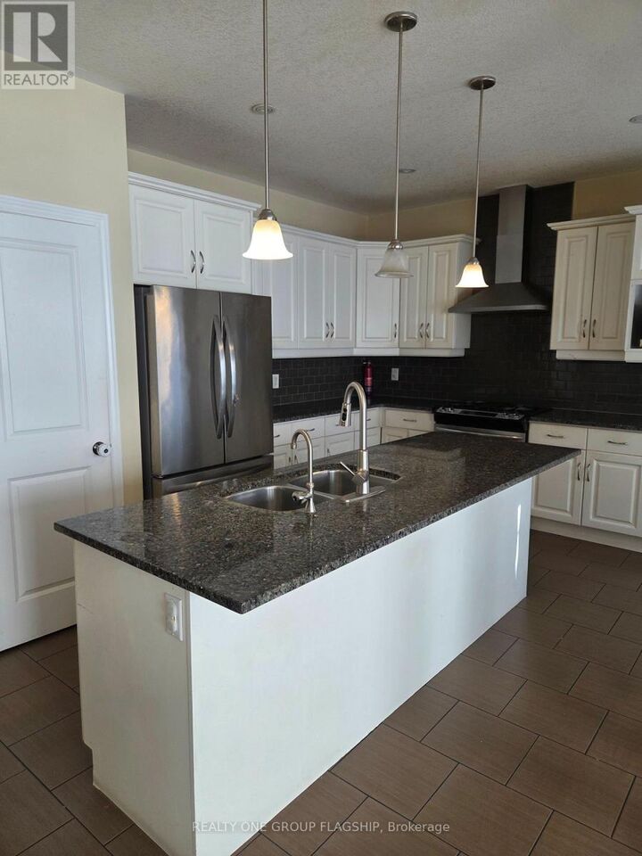 Property Photo:  218 Tremaine Crescent  ON N2A 4L9 