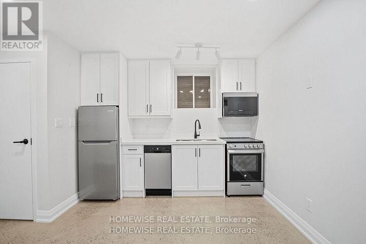 Property Photo: 2563 Dundas Street West 5 ON M6P 1X6