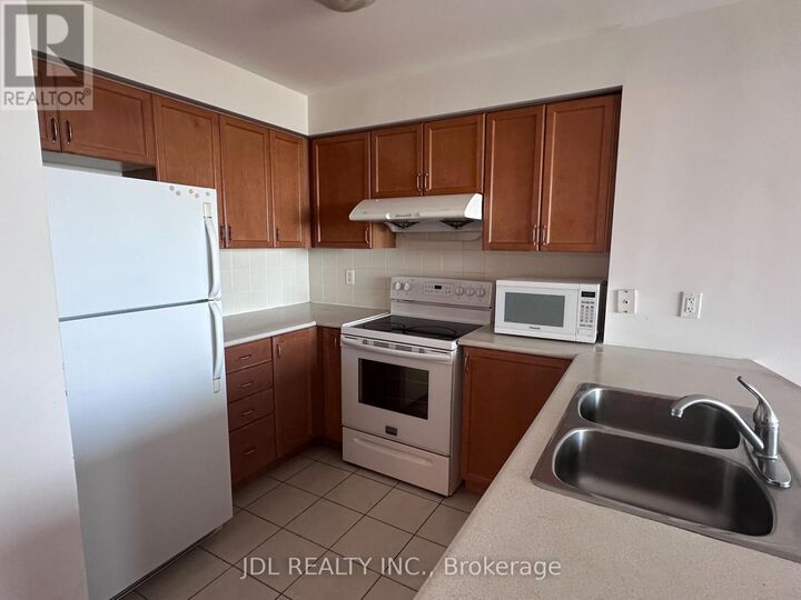 Property Photo: 60 Brian Harrison Way 1909 ON M1P 5J5