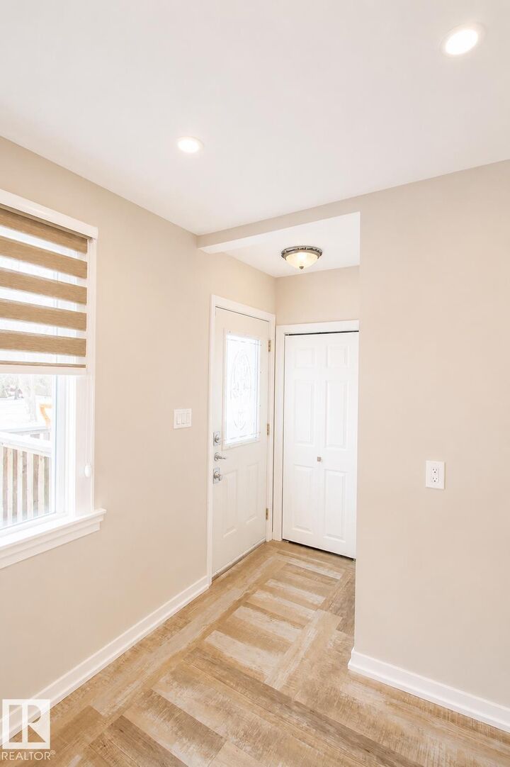 Property Photo:  10815 112 Street NW  AB T5H 3H4 