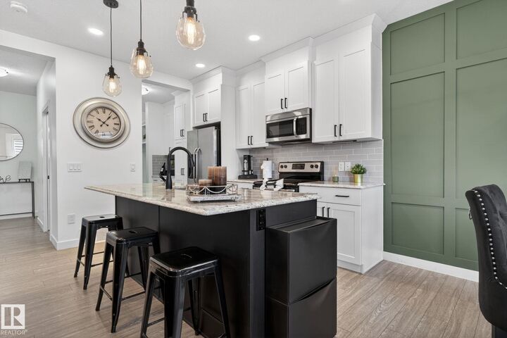 Property Photo: 8612 Cushing Place SW AB T6W 3R4