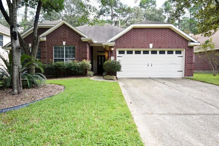 Property Photo: 34 S Rambling Ridge Place TX 77385