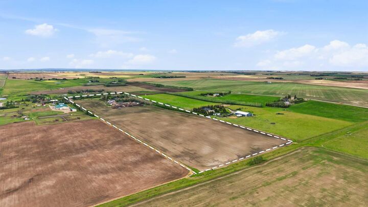 Property Photo: 265190 Panorama Road AB T4B 3L5