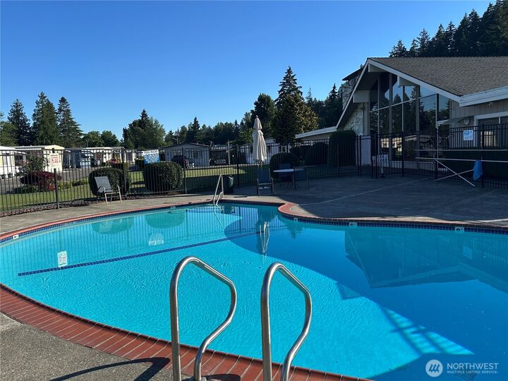 Property Photo:  2302  R Street SE 140  WA 98002 