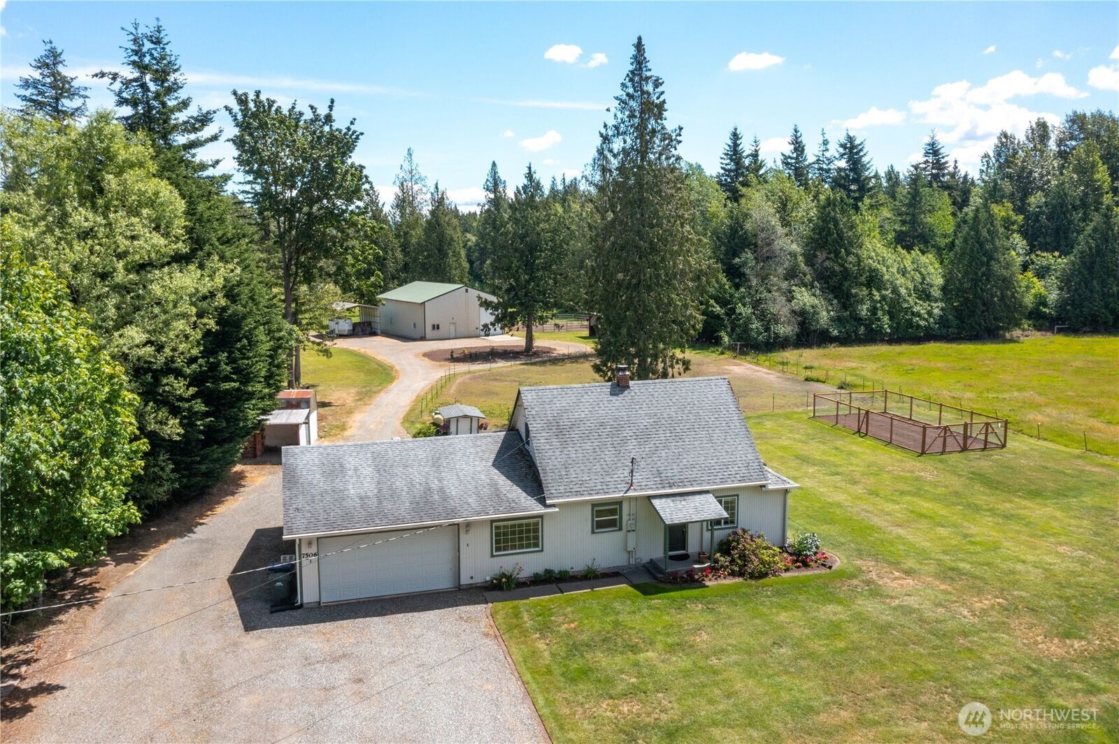 Property Photo: 7506 Woodland Road WA 98248