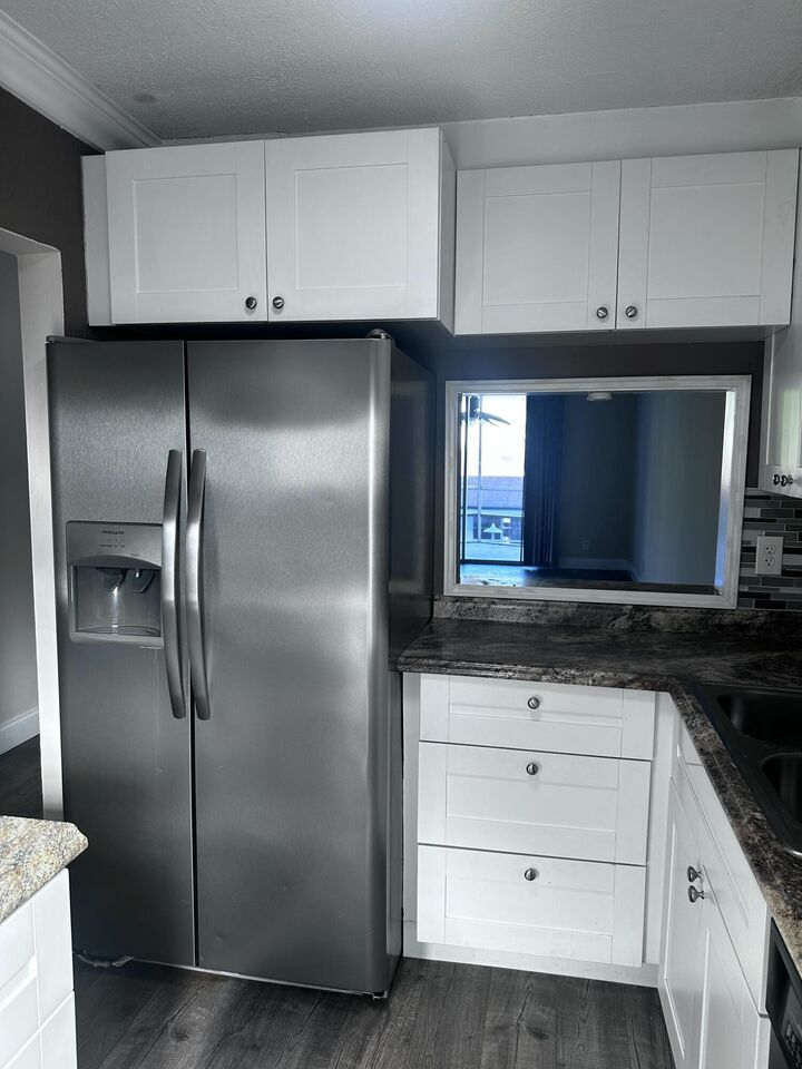 Property Photo:  1040 SE 4th Avenue 222  FL 33441 
