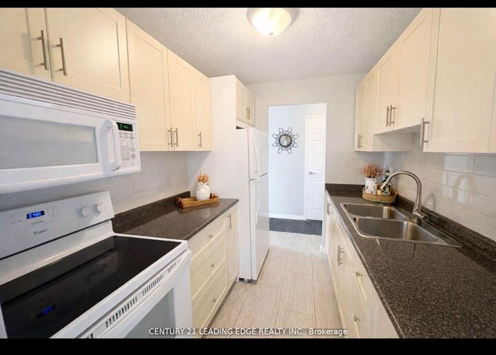 Property Photo:  936 Glen Street S 209  ON L1J 5Z7 