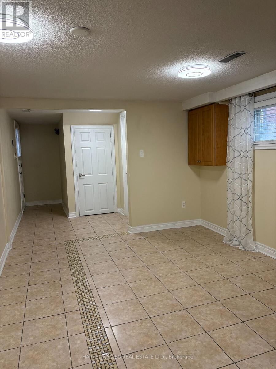 Property Photo: 72 Button Road Bsmt ON L4L 1K1
