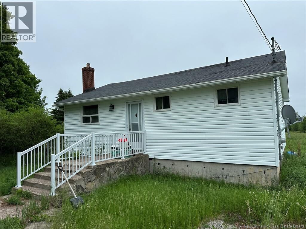 Property Photo:  709 Saint-Charles  NB E4W 4Z6 