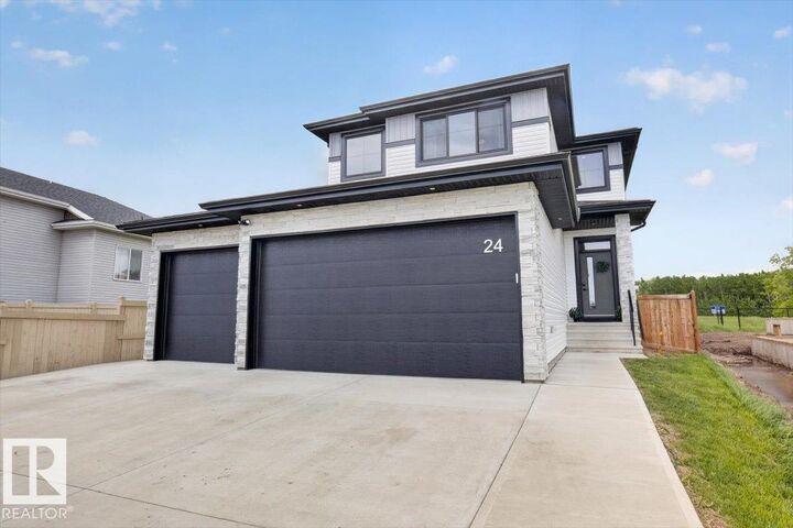 Property Photo:  24 Maple Crescent  AB T0A 1N0 