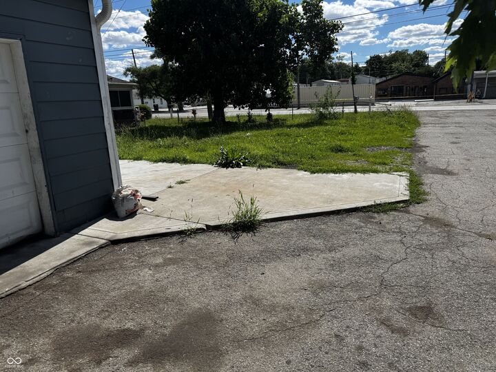 Property Photo: 1219 S Tibbs Avenue IN 46241