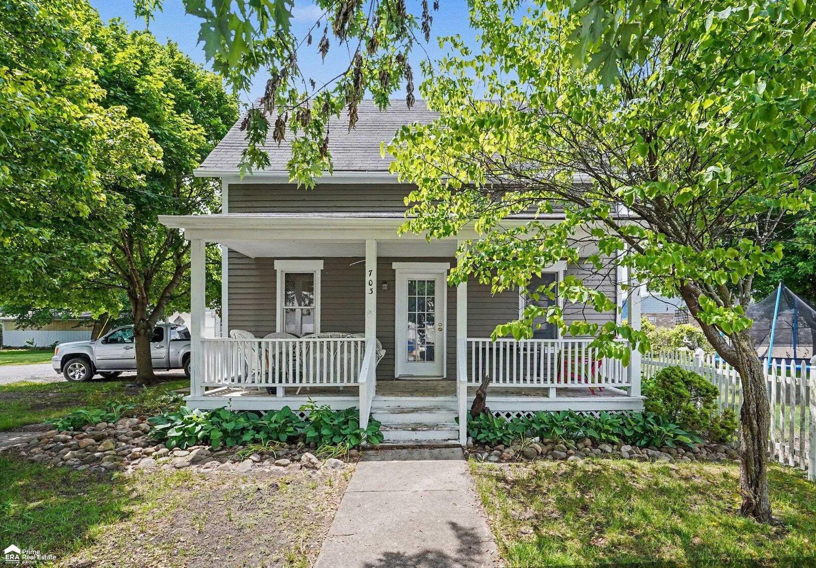 Property Photo:  703 Brady Street  MI 48616-1120 