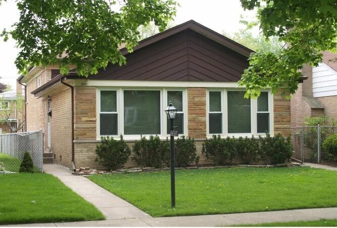Property Photo:  8837 Menard Avenue  IL 60053 