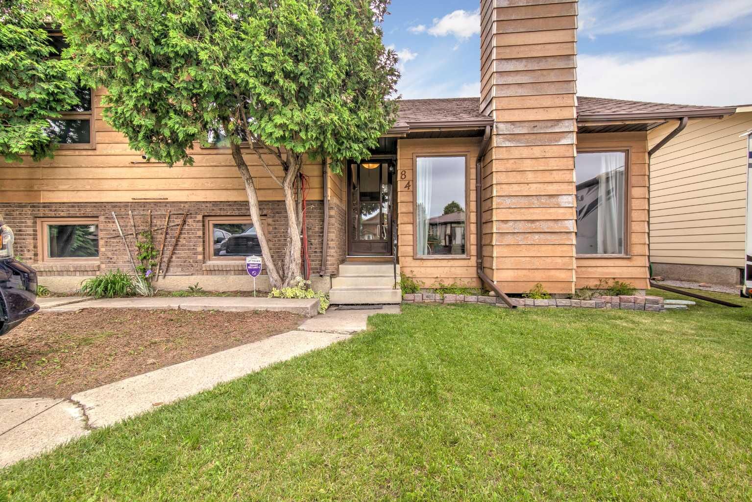 Property Photo:  84 Erminedale Boulevard N  AB T1H 5Y3 
