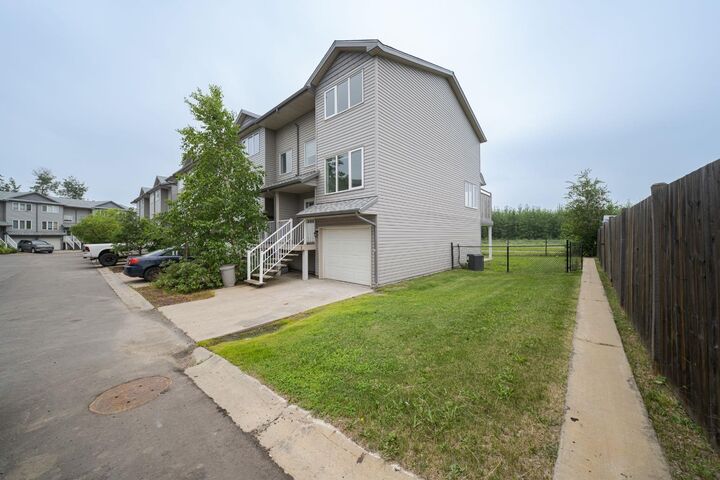 Property Photo: 100 Albion Drive 30 AB T9K 2X6