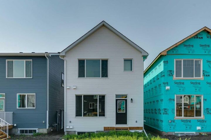 Property Photo: 160 Snowberry Common SE AB T3M 4G7