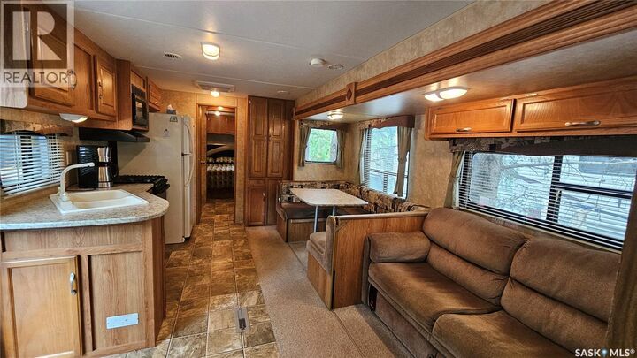 Property Photo:  16 Poplar Beach Resort Village  SK S0K 4P0 