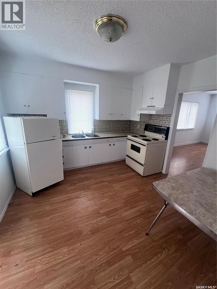 Property Photo:  213 3rd Street N  SK S0K 4P0 