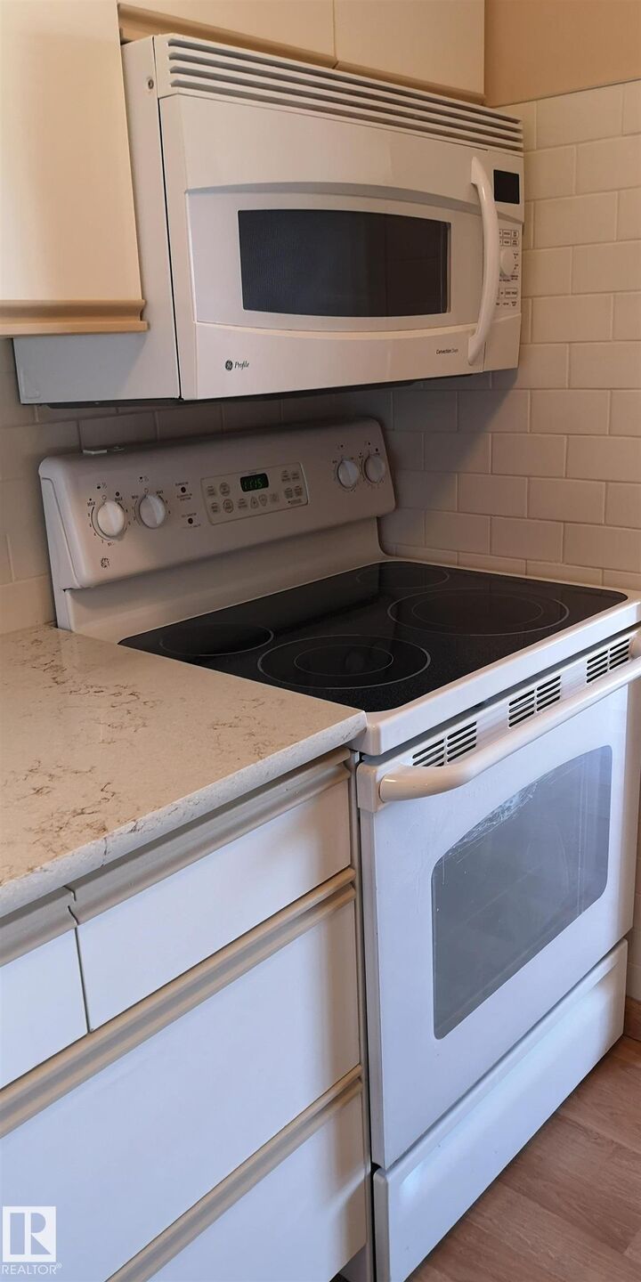 Property Photo:  6720 158 Avenue NW 324  AB T5Z 3B1 