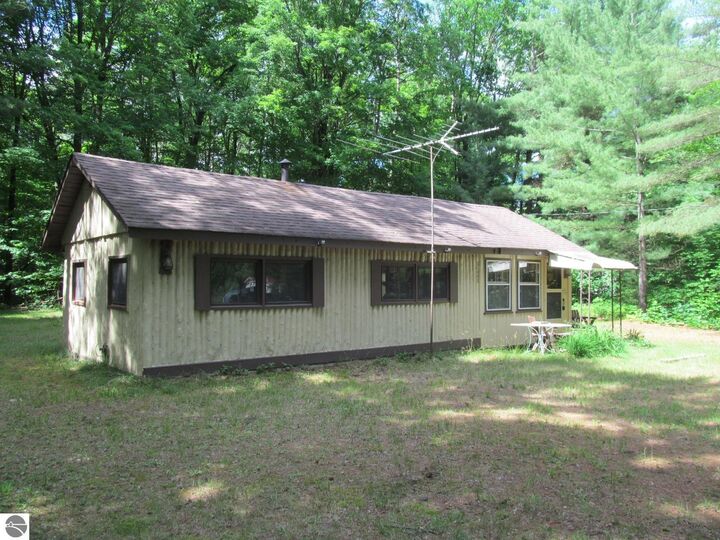 Property Photo:  11052 N Hodenpyle Dam Road  MI 49668 