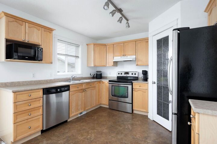 Property Photo: 182 McDougall Crescent AB T9K 2P7