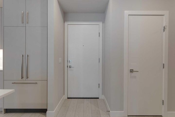 Property Photo: 8370 Broadcast Avenue SW 206 AB T3H 6L3