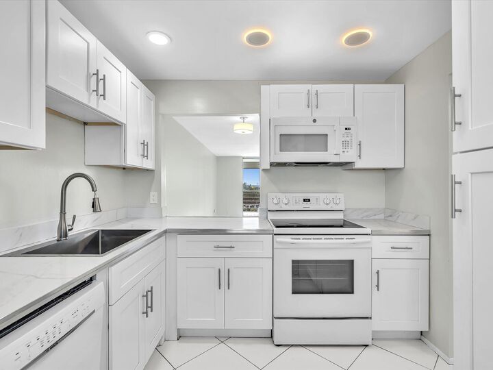 Property Photo:  6161 NW 2nd Avenue  FL 33487 