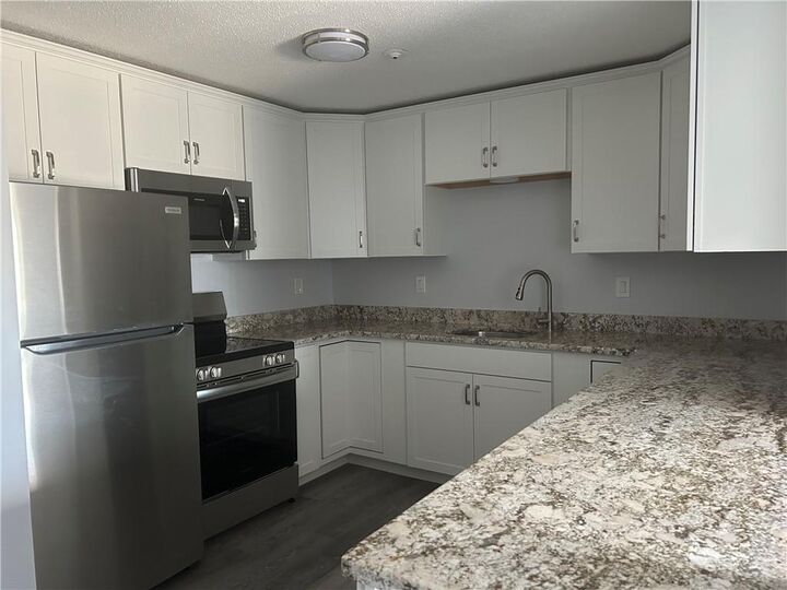 Property Photo:  728 Beverage Hill Avenue 16  RI 02861 