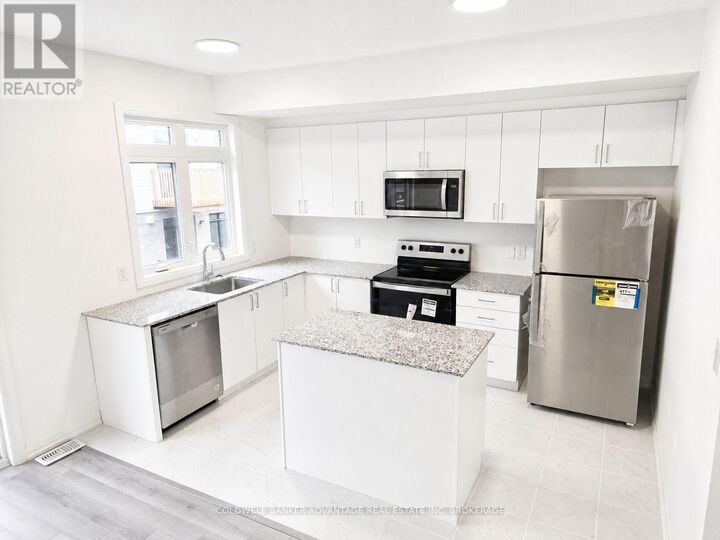 Property Photo: 27 Sidney Rose Common 26 ON L2T 2K1
