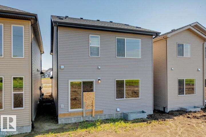 Property Photo: 17328 5 Street NW AB T5Y 6G4