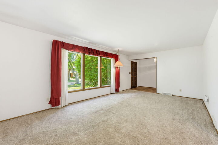 Property Photo:  9069 N Maura Ln  WI 53223 