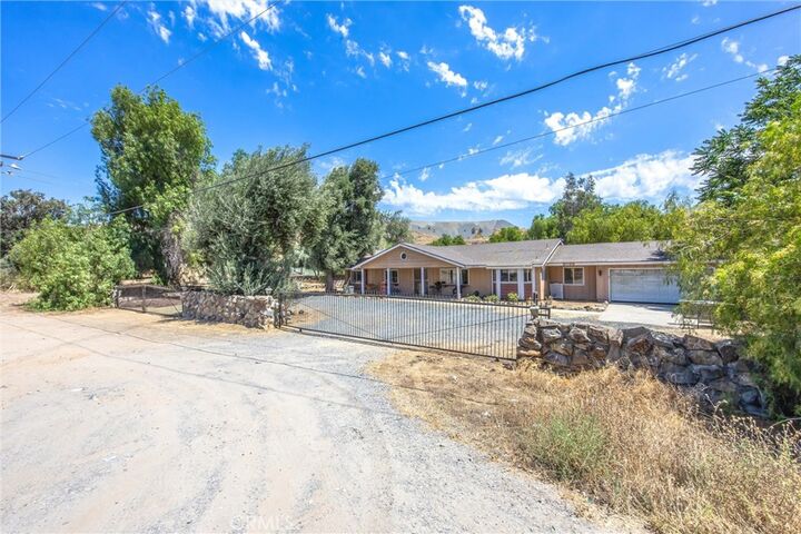 Property Photo:  9099 Cajalco  CA 92881 