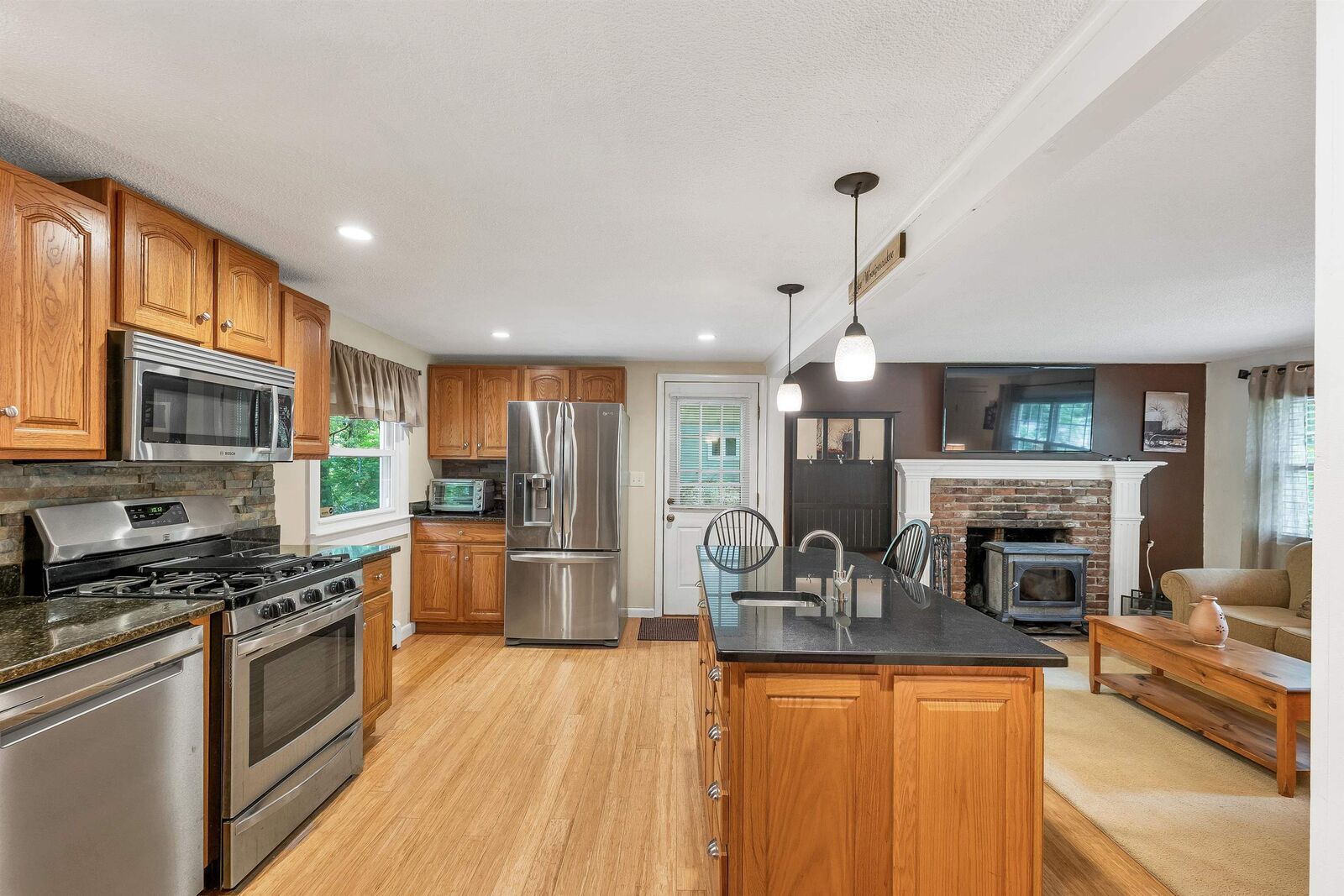 Property Photo: 64 Woodvale Drive NH 03246
